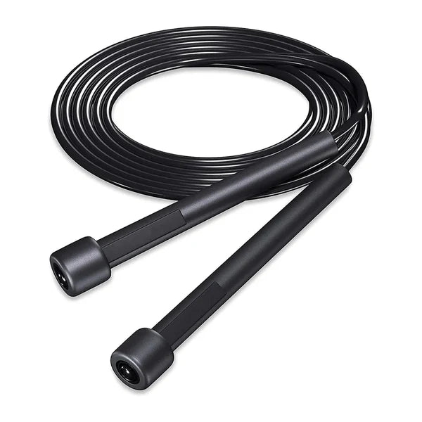 Black jump rope coiled on a white background