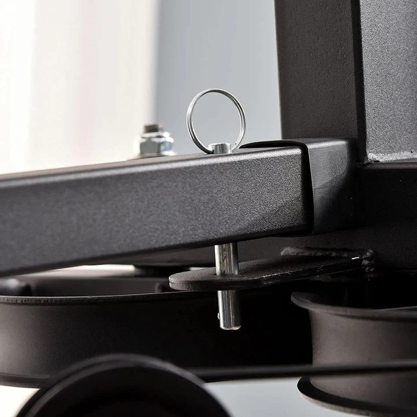 Close-up of a mechanical component with a metallic finish on a blurred background