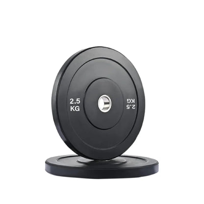 Pair of black weight plates with '2.5 KG' marking on a white background