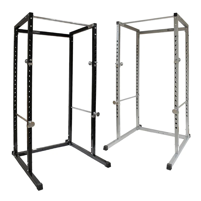 Black and silver power rack on a white background